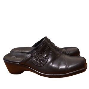 Clarks Clogs in a solid Black Leather Slip on Shoe style with a Heel Comfort